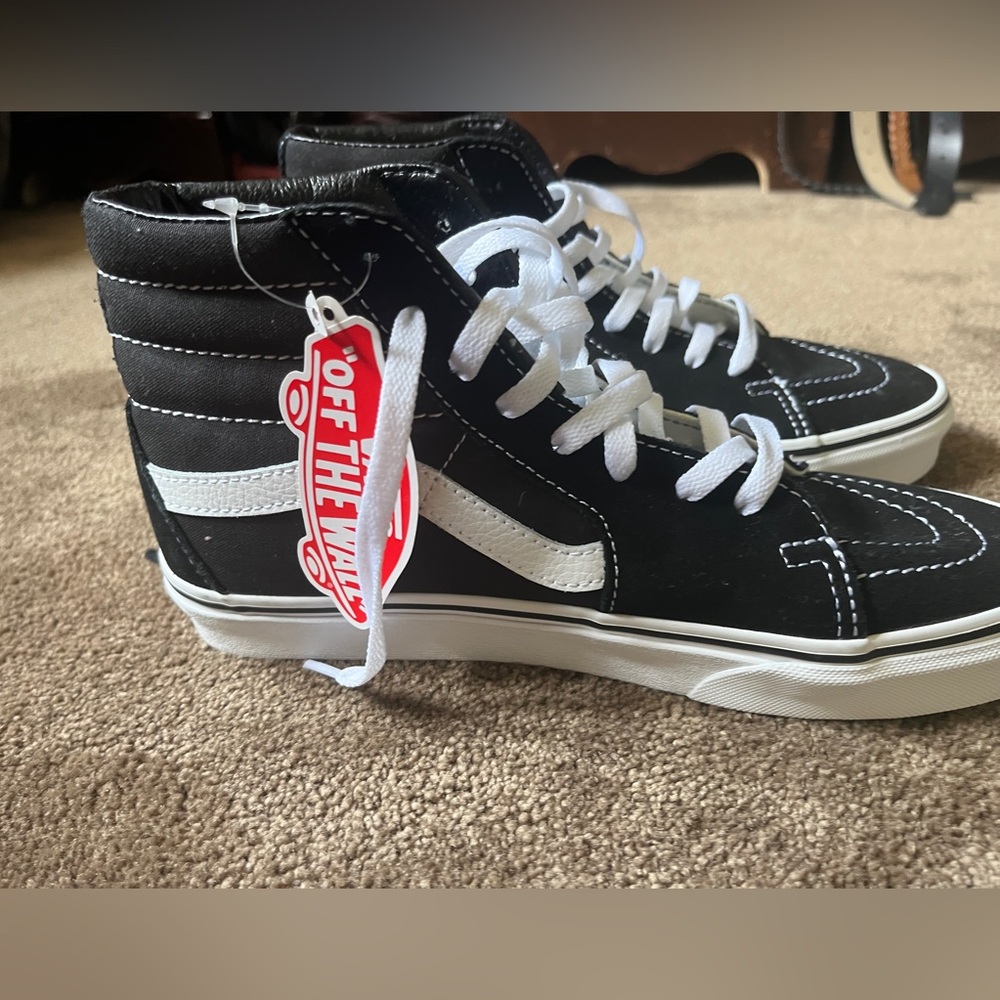 Vans hightops,  tag attached